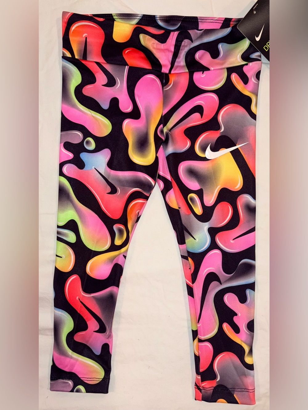 Nike brightly patterned leggings sz 4 NWT